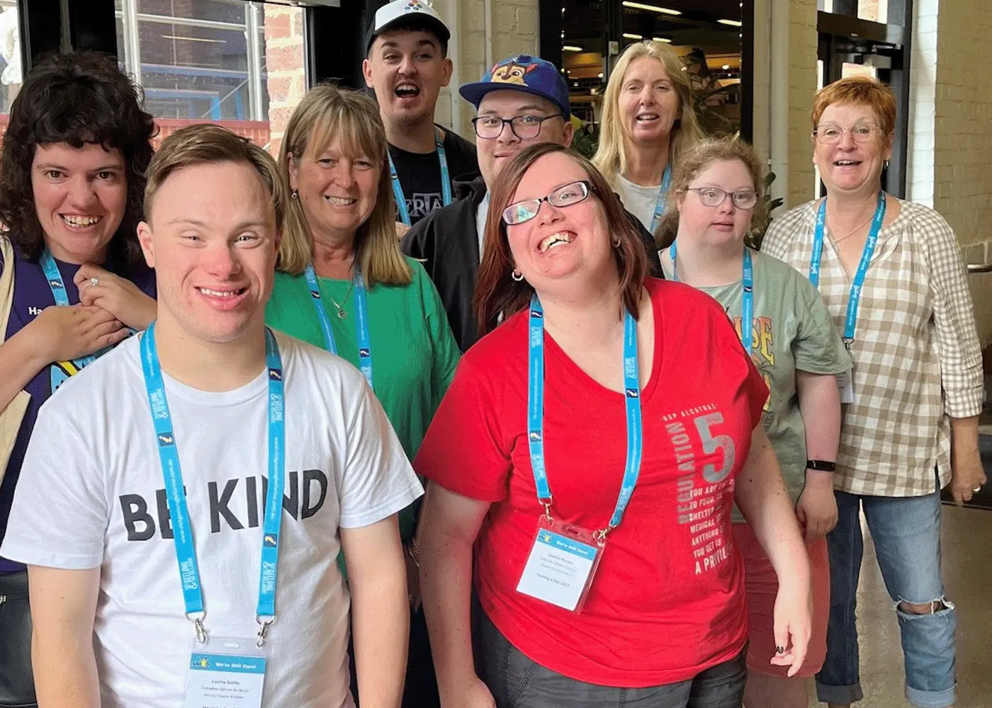 A. group of people wearing lanyards attend a conference