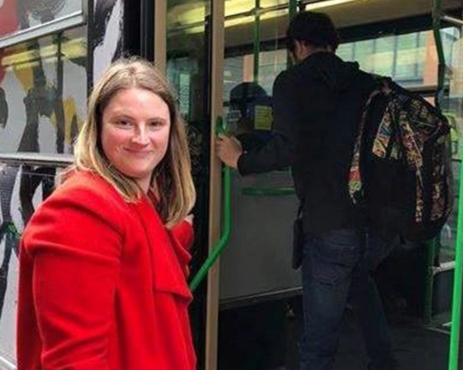A woman steps onto a tram at NDIS registered disability service Distinctive Options